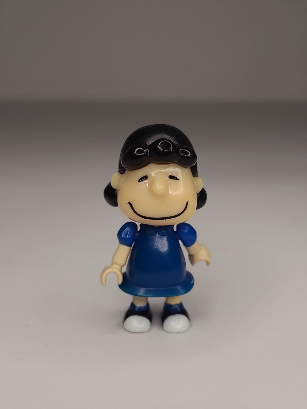 Peanuts Lucy Van Pelt 1.75" Figure Dark Blue Dress Bendable Legs Charlie Brown
